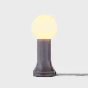 Decorative table lamp with G95 bulb included, 3 6/8" length x 3 6/8" width x 8 7/8" height, 6W, E26 base, Smoke Grey finish. Includes dimmer, 110-120V, Damp Location, recycled glass construction, 2-year warranty.